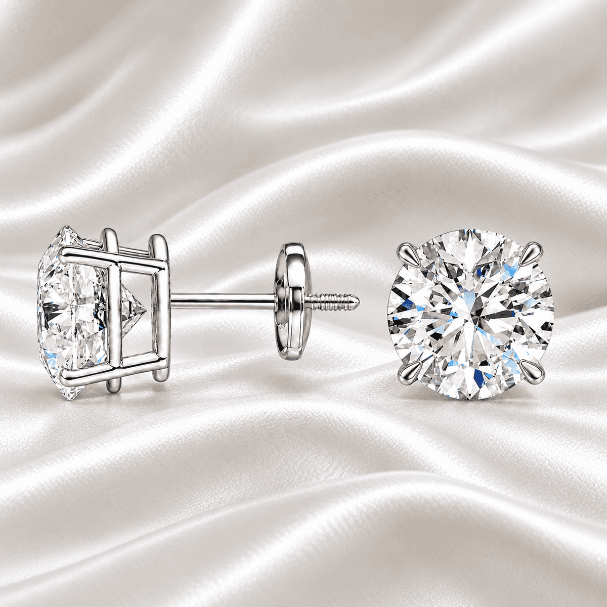 Classic 2 carat total weight round diamond stud earrings in a white gold setting