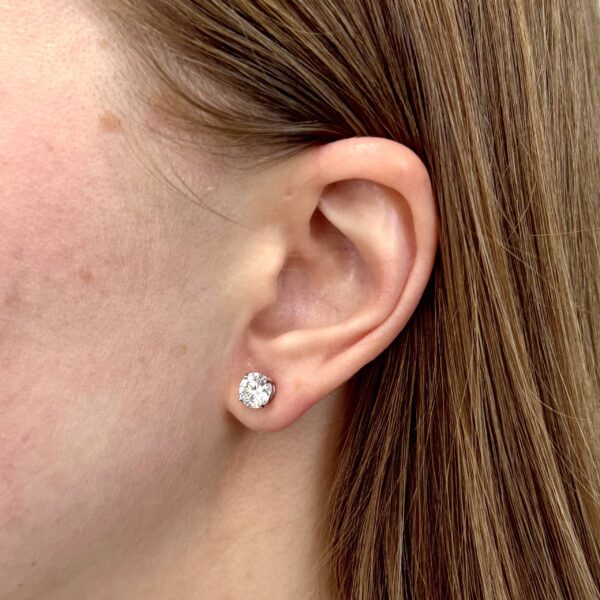 1 carat Diamond Stud on young woman's ear