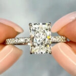Classic engagement ring with a 3.07 carat diamond and hidden halo in platinum